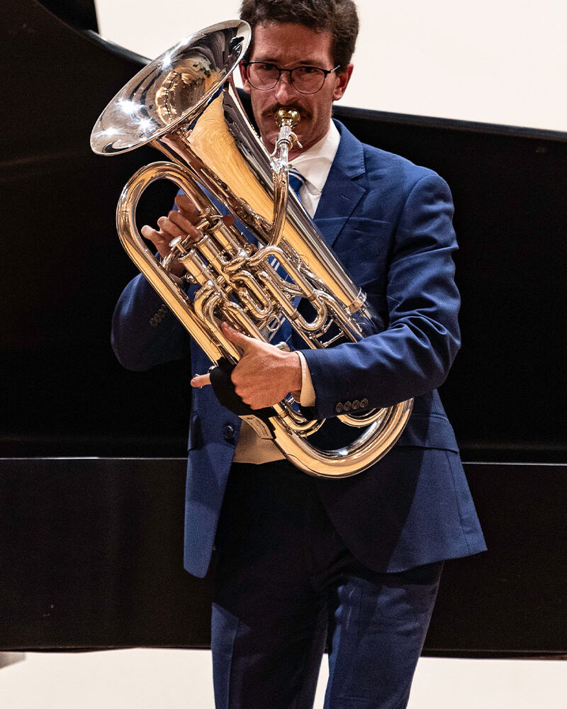 Brass musician performing onstage at the 2026 Byrd Competition